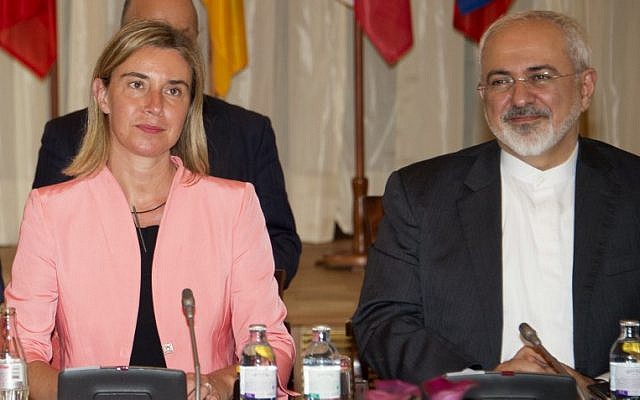 Federica Mogherini (L), High Representative of the European Union for Foreign Affairs and Security Policy, and Iranian Foreign Minister Mohammad Javad Zarif attend a meeting at the table at the Palais Coburg Hotel, where the Iran nuclear talks meetings are being held, in Vienna, Austria on July 6, 2015. (AFP PHOTO / JOE KLAMAR) Federica Mogherini (L), High Representative of the European Union for Foreign Affairs and Security Policy, and Iranian Foreign Minister Mohammad Javad Zarif attend a meeting at the table at the Palais Coburg Hotel, where the Iran nuclear talks meetings are being held, in Vienna, Austria on July 6, 2015. (AFP PHOTO / JOE KLAMAR)