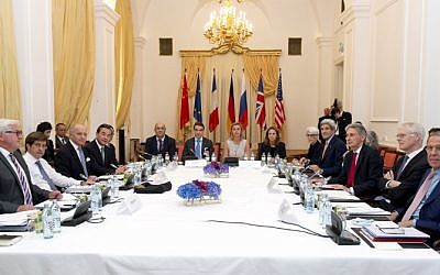 German Foreign Minister Frank-Walter Steinmeier (L), French Foreign Minister Laurent Fabius (3rd L), China's Foreign Minister Wang Yi (4th L), High Representative of the European Union for Foreign Affairs and Security Policy, Federica Mogherini (C), US Secretary of State John Kerry (4th R), British Foreign Minister Philip Hammond (3rd R) and Russian Foreign Minister Sergey Lavrov (R) meet at the table at the Palais Coburg Hotel, where the Iran nuclear talks meetings are being held, in Vienna, Austria on July 7, 2015. (AFP PHOTO / JOE KLAMAR)