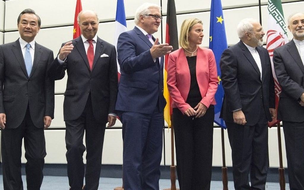 (From L to R) Chinese Foreign Minister Wang Yi, French Foreign Minister Laurent Fabius, German Foreign Minister Frank-Walter Steinmeier, EU High Representative for Foreign Affairs Federica Mogherini, Iranian Foreign Minister Mohammad Javad Zarif, and Head of the Iranian Atomic Energy Organization Ali Akbar Salehi pose for a group picture at the United Nations building in Vienna, Austria on July 14, 2015. (Joe Klamar/AFP)