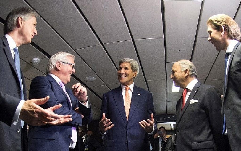French Foreign Minister Laurent Fabius, second from right, German Minister for Foreign Affairs Frank-Walter Steinmeier, second from left, Russian Foreign Minister Sergey Lavrov, British Foreign Secretary Philip Hammond, left, US Secretary of State John Kerry, center, and Austria's Foreign minister Sebastian Kurz, right, talk prior to their final plenary meeting at the United Nations building in Vienna, Austria July 14, 2015. (Joe Klamar/AFP)