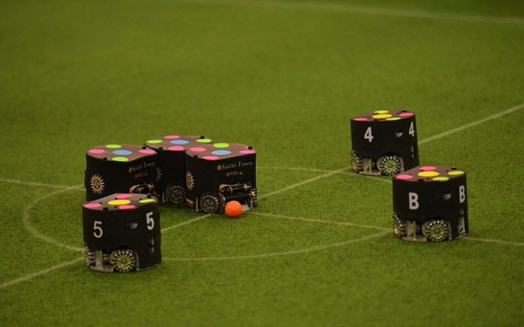Robots compete during a match at the RoboCup 2015 in Hefei, east China's Anhui province on July 22, 2015. (AFP)