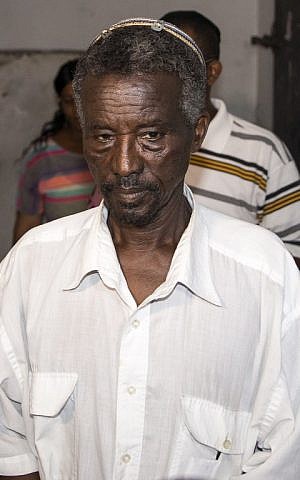 The father of Avraham Mengistu, 29, an Israeli of Ethiopian descent who is reportedly held captive in the Gaza Strip, stands during a press conference in the southern city of Ashkelon on July 9, 2015, in which the family called on Hamas to release his brother and the Israeli government to work toward his safe return. (AFP PHOTO / JACK GUEZ)