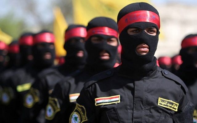 Iraqi members from the Popular Mobilisation units take part in a demonstration marking the Quds (Jerusalem) International day in the capital Baghdad, on July 10, 2015. (AFP/AHMAD AL-RUBAYE) Iraqi members from the Popular Mobilisation units take part in a demonstration marking the Quds (Jerusalem) International day in the capital Baghdad, on July 10, 2015. (AFP/AHMAD AL-RUBAYE)