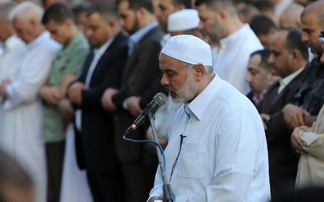 Hamas leader Ismail Haniyeh takes part in the Eid al-Fitr prayer early on July 17, 2015 (Mahmud Hams/AFP) Hamas leader Ismail Haniyeh takes part in the Eid al-Fitr prayer early on July 17, 2015 (Mahmud Hams/AFP)