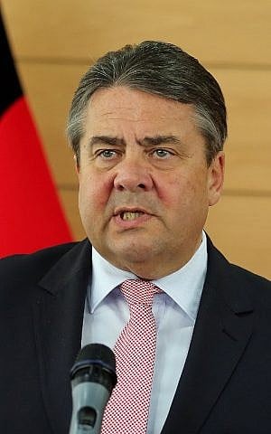 German Economy and Energy Minister Sigmar Gabriel speaks during a press conference in Tehran on July 20, 2015. (AFP PHOTO/ATTA KENARE)