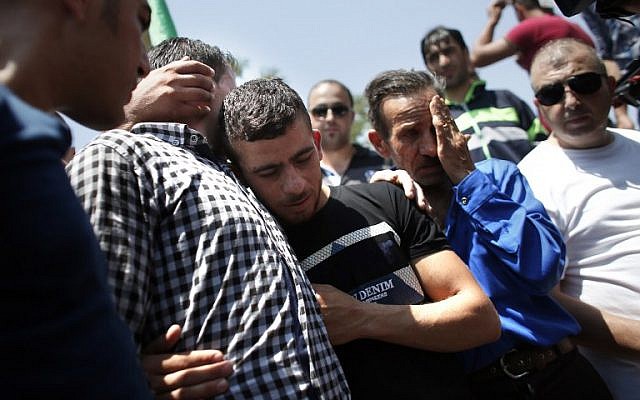 Relatives mourn during the funeral of 18-month-old Palestinian toddler Ali Saad Dawabsha, who died after his house was set on fire in an attack by suspected Jewish terrorists, in the West Bank village of Duma on July 31, 2015. (AFP PHOTO / THOMAS COEX) Relatives mourn during the funeral of 18-month-old Palestinian toddler Ali Saad Dawabsha, who died after his house was set on fire in an attack by suspected Jewish terrorists, in the West Bank village of Duma on July 31, 2015. (AFP PHOTO / THOMAS COEX)