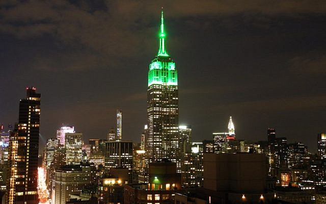 The Empire State Building is lit in green July 17, 2015 in New York City to celebrate the Eid al-Fitr holiday that marks the end of Ramadan. (AFP PHOTO/BRIGITTE DUSSEAU)