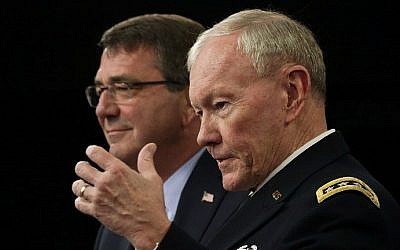 US Secretary of Defense Ashton Carter (L) and Chairman of the Joint Chief of Staff Gen. Martin Dempsey (R) participate in a news conference July 1, 2015 at the Pentagon in Arlington, Virginia. (Alex Wong/Getty Images/AFP)