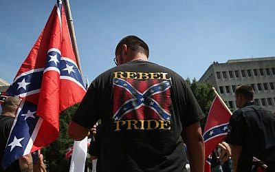 Ku Klux Klan members take part in a Klan demonstration at the state house building on July 18, 2015 in Columbia, South Carolina. (John Moore/Getty Images/AFP)