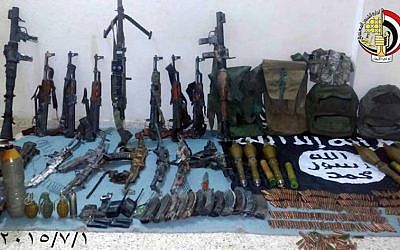 A photo shared by the Egyptian military shows a weapons cache seized from IS-linked jihadists in the Sinai Peninsula, July 2, 2015. (Facebook/Egyptian army) A photo shared by the Egyptian military shows a weapons cache seized from IS-linked jihadists in the Sinai Peninsula, July 2, 2015. (Facebook/Egyptian army)