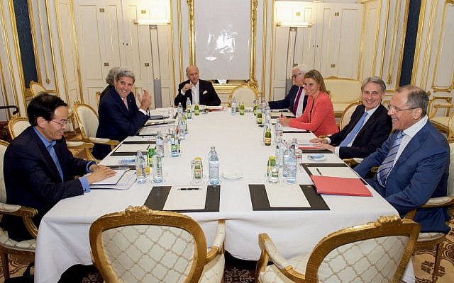 US Secretary of State John Kerry sits with Chinese Ambassador Cheng Jingye, bottom left, US Energy Secretary of Energy Dr. Ernest Moniz, French Foreign Minister Laurent Fabius, German Foreign Minister Frank-Walter Steinmeier, European Union High Representative for Foreign Affairs Federica Mogherini, British Foreign Secretary Philip Hammond, and Russian Foreign Minister Sergey Lavrov at the Palais Coburg Hotel in Vienna, Austria, in the early morning hours of July 14, 2015. (US State Department) US Secretary of State John Kerry sits with Chinese Ambassador Cheng Jingye, bottom left, US Energy Secretary of Energy Dr. Ernest Moniz, French Foreign Minister Laurent Fabius, German Foreign Minister Frank-Walter Steinmeier, European Union High Representative for Foreign Affairs Federica Mogherini, British Foreign Secretary Philip Hammond, and Russian Foreign Minister Sergey Lavrov at the Palais Coburg Hotel in Vienna, Austria, in the early morning hours of July 14, 2015. (US State Department)