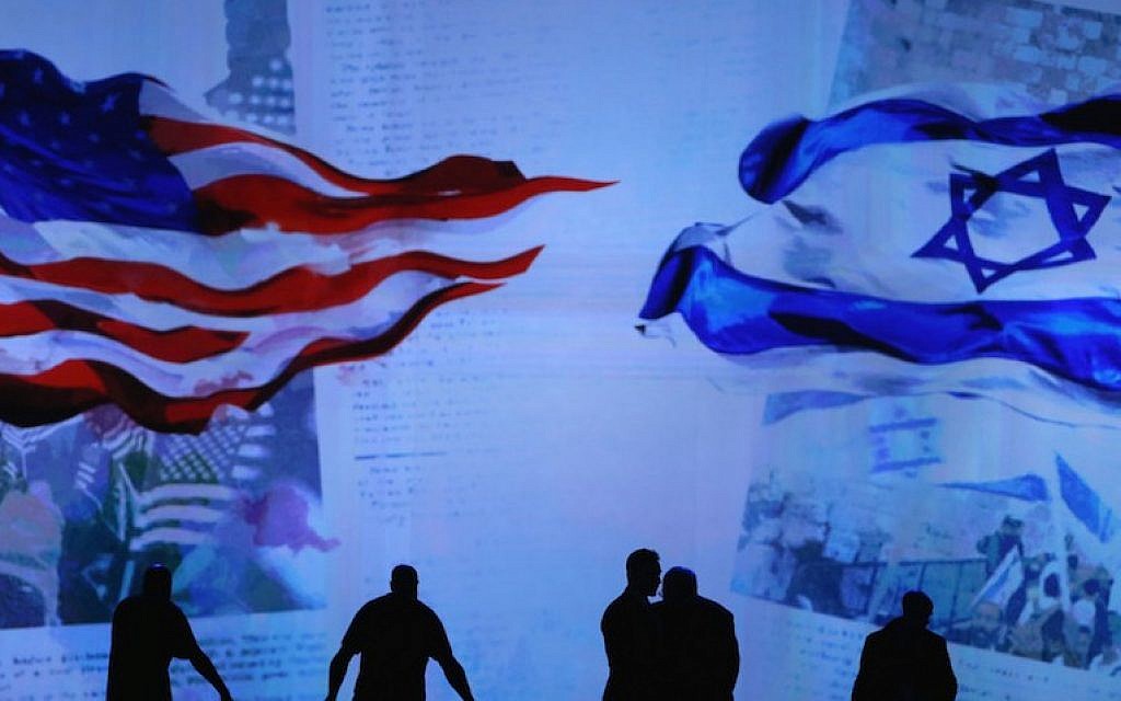 Workers prepare the stage before Israeli Prime Minister Benjamin Netanyahu's address to the AIPAC 2015 Policy Conference on March 2, 2015. (Mark Wilson/Getty Images/JTA)