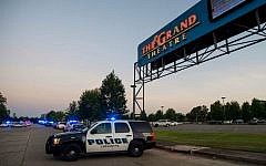 A Lafayette Police Department vehicle blocks an entrance at the Grand Theatre in Lafayette, Louisiana, following a shooting,  July 23, 2015. (Paul Kieu/The Daily Advertiser via AP)