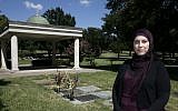 Alia Salem, executive director of the Dallas-Fort Worth chapter of the Council on American-Islamic Relations poses for a photo by an open-air pavilion in the Islamic Garden, a burial site for members of the Muslim faith that is part of the Restland Cemetery, Friday, July 17, 2015, in Dallas. (Tony Gutierrez/AP)