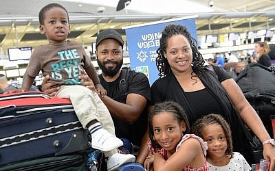 Aaron and Tracy Beavers and family at John F. Kennedy Airport in New York on their way to Israel to make aliyah, July 13, 2015. (Courtesy of Shahar Azran/Nefesh B’Nefesh/JTA)
