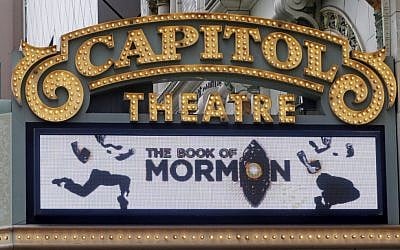 The Capitol Theatre marquee displays the "Book of Mormon" musical, Monday, July 27, 2015, in Salt Lake City. (AP Photo/Rick Bowmer)