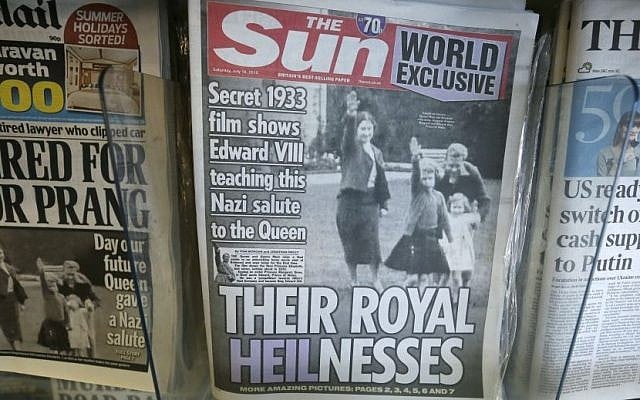 A row of newspapers on display including a paper with a photo of Britain's Queen Elizabeth as a child giving a Nazi salute, in a shop, in London, Saturday July 18, 2015. (AP Photo/Tim Ireland) A row of newspapers on display including a paper with a photo of Britain's Queen Elizabeth as a child giving a Nazi salute, in a shop, in London, Saturday July 18, 2015. (AP Photo/Tim Ireland)