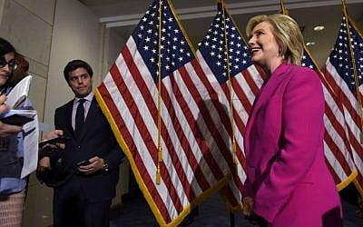 Democratic presidential candidate Hillary Rodham Clinton walks away from the microphones after speaking to reporters on the deal with Iran, Tuesday, July 14, 2015, on Capitol Hill in Washington. (AP Photo/Susan Walsh)