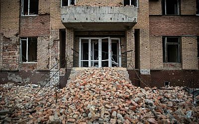 A heavily damaged hotel near the Donetsk airport in Ukraine, Feb. 26, 2015. The fighting between Ukraine and Russian-backed rebels has wreaked havoc on Ukraine's currency, the hryvnia. (Andrew Burton/Getty Images/via JTA)