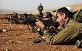 Illustrative: Soldiers in the IDF's Netzah Yehuda Battalion at the Peles Military Base in the northern Jordan Valley, August 2013. (Yaakov Naumi/Flash90)