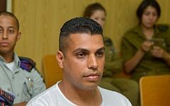 Former commander of the Tzabar battalion of the IDF Givati Brigade  Liran Hajabi (R) seen in court in Tel Aviv on July 2, 2015. (Flash90)