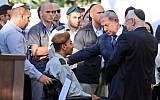 Prime Minister Benjamin Netanyahu and President Reuven Rivlin attend a ceremony marking one year since Operation Protective Edge at the Mount Herzl military cemetery in Jerusalem on July 6, 2015.(Haim Zach/GPO)