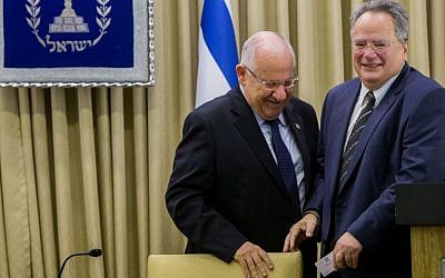 President Reuven Rivlin (L) meets with Greek Foreign Minister Nikolaos Kotzias (R), at the President's Residence in Jerusalem on July 7, 2015. (Yonatan Sindel/Flash90)