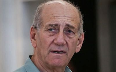 Former prime minister Ehud Olmert leaves the Jerusalem District Court after the court agreed to postpone his imprisonment until after an October appeal, July 8, 2015. (Hadas Parush/Flash90)
