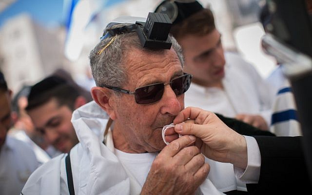 Holocaust survivors celebrate their belated bar mitzvah at the Western Wall, Judaism's holiest site, in Jerusalem's Old City on July 13, 2015.(Yonatan Sindel/Flash90) Holocaust survivors celebrate their belated bar mitzvah at the Western Wall, Judaism's holiest site, in Jerusalem's Old City on July 13, 2015.(Yonatan Sindel/Flash90)