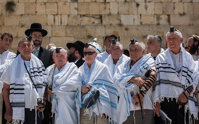 Holocaust survivors pose for a photo after celebrating their belated bar mitzvah at the Western Wall in Jerusalem's Old City, on July 13, 2015. (Yonatan Sindel/Flash90) Holocaust survivors pose for a photo after celebrating their belated bar mitzvah at the Western Wall in Jerusalem's Old City, on July 13, 2015. (Yonatan Sindel/Flash90)