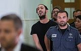 Shlomo Twitto (c) outside the District Court in Jerusalem on July 22, 2015. (Yonatan Sindel/Flash90)