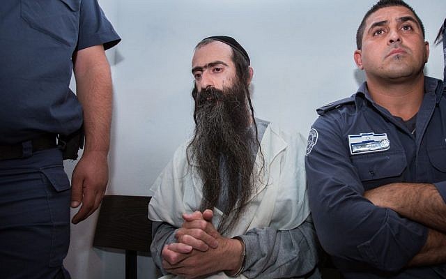 Yishai Schlissel, who stabbed six people at the annual Jerusalem Gay Pride Parade on July 30, 2015, is seen in the Jerusalem Magistrate's Court on July 31, 2015. (Yonatan Sindel/Flash90) Yishai Schlissel, who stabbed six people at the annual Jerusalem Gay Pride Parade on July 30, 2015, is seen in the Jerusalem Magistrate's Court on July 31, 2015. (Yonatan Sindel/Flash90)