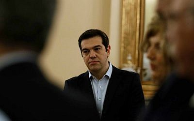 Greece's Prime Minister Alexis Tsipras attends the swearing in ceremony of his new ministers at the Presidential Palace in Athens, Saturday, July 18, 2015. (AP Photo/Thanassis Stavrakis)