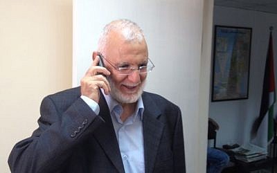 Hamas MP Muhammad Abu Tir receives congratulations upon his release from prison, Ramallah, July 30, 2015 (Elhanan Miller/Times of Israel)
