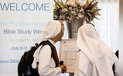 A pair of nuns on their way to the first International Bible Study Week in Jerusalem, July 6-9, 2015. (Dave Sinai)