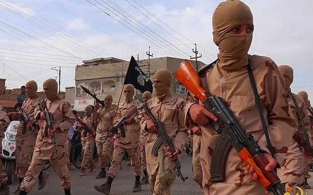 In this photo released on April 25, 2015 by a militant website, which has been verified and is consistent with other AP reporting, young boys known as the "lion cubs" hold rifles during a parade after graduating from a religious school in Tal Afar, near Mosul, northern Iraq. (Militant website via AP) In this photo released on April 25, 2015 by a militant website, which has been verified and is consistent with other AP reporting, young boys known as the "lion cubs" hold rifles during a parade after graduating from a religious school in Tal Afar, near Mosul, northern Iraq. (Militant website via AP)