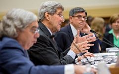 Secretary of State John Kerry, center, flanked by Treasury Secretary Jacob Lew, right, and Energy Secretary Ernest Moniz, testifies on Capitol Hill in Washington, Tuesday, July 28, 2015, before the House Foreign Affairs Committee hearing on the Iran nuclear agreement. (AP Photo/Andrew Harnik)