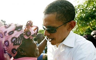 In this Saturday, Aug. 26, 2006 file photo, then US Senator Barack Obama meets with his step-grandmother Sarah Obama at his father's house in Kogelo, western Kenya. (AP Photo/Sayyid Azim, File)