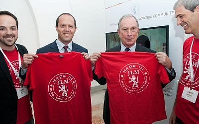 Mayor of Jerusalem, Nir Barkat (left), with Michael Bloomberg, former mayor of New York, at a MadeinJLM event on May 21, 2014 (Courtesy)