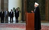 Iran's President Hassan Rouhani addresses the nation in a televised speech minutes after a landmark nuclear agreement was announced in Vienna, in Tehran, Iran, Tuesday, July 14, 2015. (AP Photo/Ebrahim Noroozi)