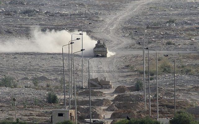 An Egyptian military personnel carrier patrols on the Egyptian side of the border between Egypt and Rafah in the southern Gaza Strip, Wednesday, July 1, 2015 (AP/Mohammed Ebaid) An Egyptian military personnel carrier patrols on the Egyptian side of the border between Egypt and Rafah in the southern Gaza Strip, Wednesday, July 1, 2015 (AP/Mohammed Ebaid)