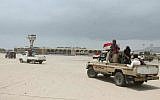 Fighters against Shiite rebels known as Houthis gather in front of the airport in the port city of Aden, Yemen, July 16, 2015. (AP/Abo Muhammed)