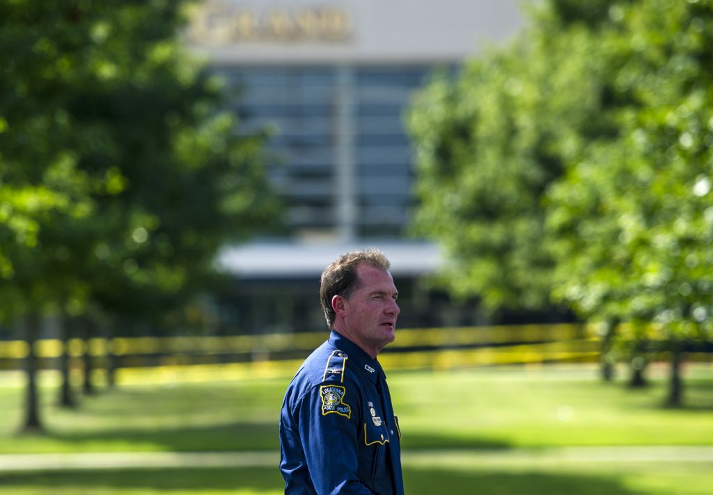 Col. Mike Edmondson, superintendent of the Louisiana State Police, walks in front of the Grand Theatre in Lafayette, La., Friday, July 24, 2015. A gunman opened fire on moviegoers inside the theater Thursday. (Paul Kieu/The Daily Advertiser via AP) Col. Mike Edmondson, superintendent of the Louisiana State Police, walks in front of the Grand Theatre in Lafayette, La., Friday, July 24, 2015. A gunman opened fire on moviegoers inside the theater Thursday. (Paul Kieu/The Daily Advertiser via AP)