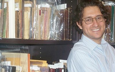 University of Washington Prof. Devin Naar is spearheading the Sephardic Studies Digital Library and Museum, a first-of-its-kind project featuring 500 historical books and thousands of rare historical documents, many from Seattle families. (Janis Siegel/The Times of Israel)