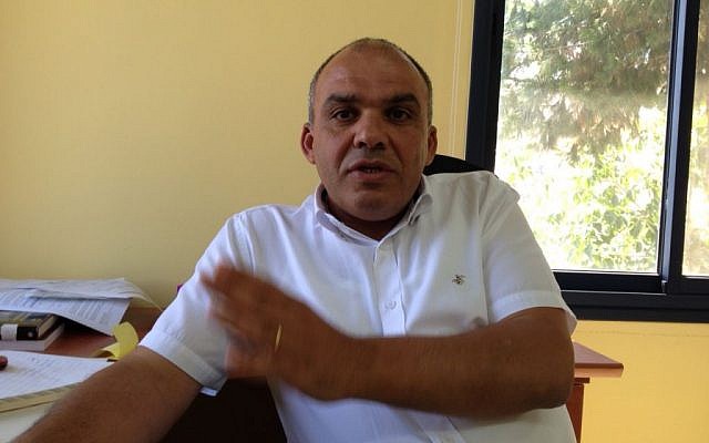 Dr. Nizar Ayoub at the office of civil rights group al-Marsad in Majdal Shams, July 8, 2015 (Elhanan Miller/The Times of Israel)