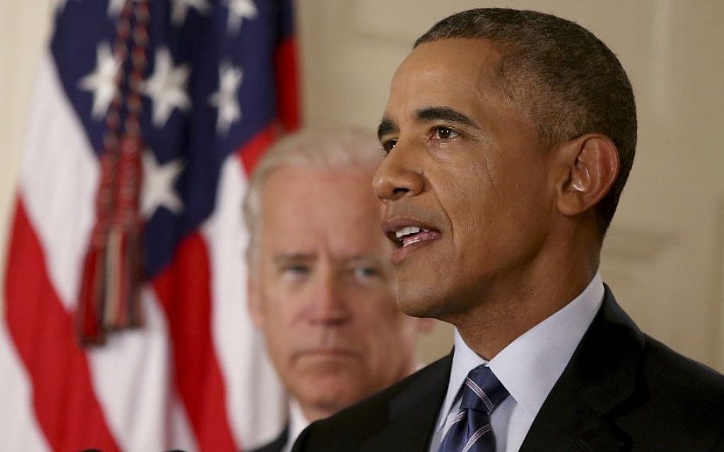 US President Barack Obama delivers remarks in the East Room of the White House as Vice President Joe Biden looks on, July 14, 2015 in Washington, DC. (AFP Photo/Pool/Andrew Harnik)