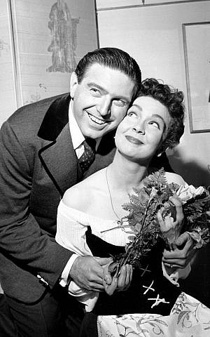 In this 1960 file photo, Renee Guerin, of Juneau, Alaska, poses with her costar Theodore Bikel after their performance of "The Sound of Music" at the Lunt-Fontanne Theatre in New York City.  (AP Photo, File)