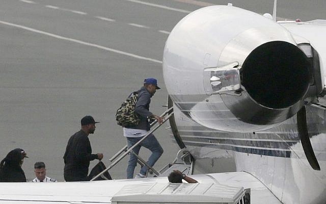 Grammy award-winning singer Chris Brown boards a chartered jet at the old Manila Domestic Airport in suburban Pasay city, south of Manila, Philippines, Friday, July 24, 2015. (AP/Bullit Marquez) Grammy award-winning singer Chris Brown boards a chartered jet at the old Manila Domestic Airport in suburban Pasay city, south of Manila, Philippines, Friday, July 24, 2015. (AP/Bullit Marquez)