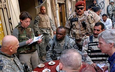 Emma Sky (second left) tours Doura Market in Baghdad in April, 2007 (Courtesy Curt Cashour)
