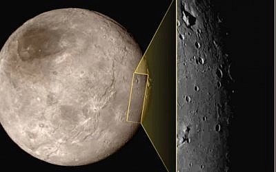 This photo taken Tuesday, July 14, 2015, at approximately 6:30 a.m. EDT, shows Pluto's largest moon Charon, left, with a captivating feature, a depression with a peak in the middle, shown in the upper left corner of the inset image at right. (NASA/JHUAPL/SwRI via AP)